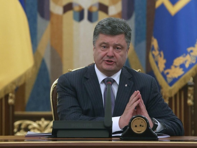 بوروشنكو: تحرك روسيا لإلغاء قرار يجيز التدخل بأوكرانيا خطوة عملية أولى (الأوروبية)