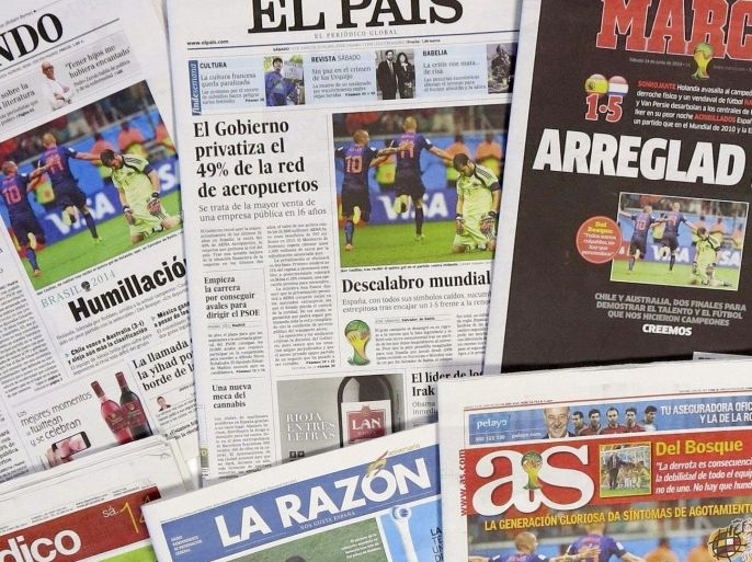 Headlines such as 'Humiliation', 'Fix this' or 'Total write-off' are published in Spanish newspapers a day after the FIFA World Cup 2014 group B preliminary round match against Netherlands, in Madrid, Spain, 14 June 2014. Spain lost against Netherlands 1-5.