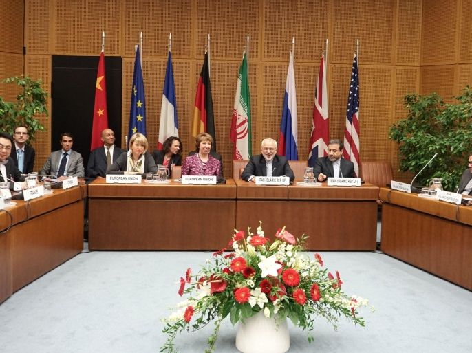 (LtoR), EU Deputy Secretary General Helga Schmid, Vice President of the European Commission Catherine Margaret Ashton, Iranian Foreign Minister Javad Mohammad Zarif, and Iranian ambassador to Austria Hassan Tajik attend a meeting at the socalled EU 5+1 talks with Iran at the UN headquarters in Vienna, on July 3, 2014. Negotiators from Iran and six world powers begin a marathon final round of talks towards a potentially historic agreement on Tehran's nuclear programme before a July 20 deadline. AFP PHOTO/JOE KLAMAR
