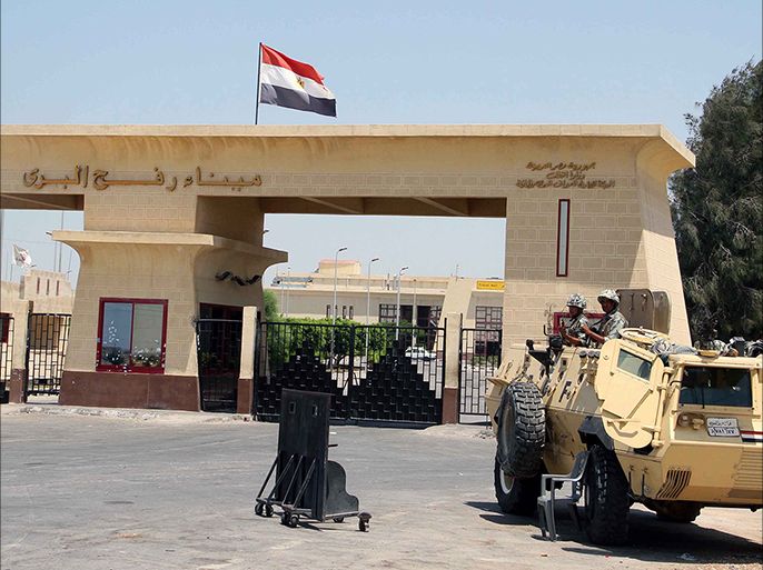 An Egyptian army armored vehicle is seen next to the closed Rafah border crossing, one day after an attack on an Egyptian checkpoint in Rafah, Egypt, 06 August 2012. Media reports state that 16 Egyptian security forces were killed and seven others injured on 05 August when militants opened fire on a checkpoint and commandeered vehicles during a Ramadan fast in Rafah. Having hijacked the vehicles, they raced to the nearby Kerem Shalom/Karm Abu Salem crossing point on the Egypt-Israel-Gaza border. Egyptian authorities closed the border crossing with the Gaza Strip at Rafah indefinitely. EPA/AHMED KHALED
