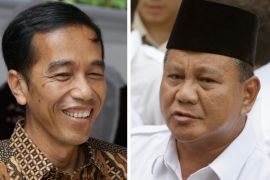 This combination of photos shows Indonesian presidential candidates, Jakarta Governor Joko Widodo, left, and former special forces commander Prabowo Subianto after they cast their votes in Jakarta, Indonesia, Wednesday, July 9, 2014. The rival candidates in Indonesia's presidential election each claimed victory Wednesday, raising the possibility of potentially destabilizing political and legal uncertainty in a nation that made the transition from dictatorship to democracy less than two decades ago. (AP Photo)