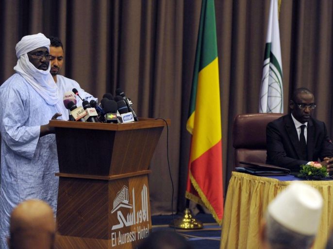 The vice president of the Tuareg National Movement for the Liberation of Azawad (MNLA), Mahamadou Djeri Maiga (L) speaks as Malian Foreign Minister Abdoulaye Diop (R), during the regional meeting to tackle conflict in Mali, in Algiers, Algeria, 16 July 2014. Several armed movements of northern Mali are meeting in Algiers to find a solution to the crisis in the country, ravaged by a war that has been threatening its territorial integrity since 2012.