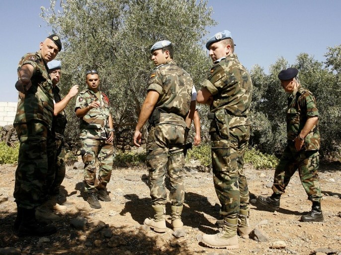Spanish soldiers from UN peacekeeper force UNIFIL and soldiers of the Lebanese army inspect rockets, which they found in the town of El-Mari, near the Israeli border, in southern Lebanon, 11 July 2014. Missiles were fired into Israeli territory from Lebanon for the first time since Israel launched operation Protective Edge on 08 July in response to rocket attacks from the Gaza Strip. According to Lebanese security sources and the country's state-run National News Agency (NNA), two rockets were fired by unknown militants from the outskirts of the town of El-Mari in Lebanon's south-west. A third missile in the same region malfunctioned and exploded while still on the launchpad, NNA said, adding that the Lebanese army defused two more rockets.