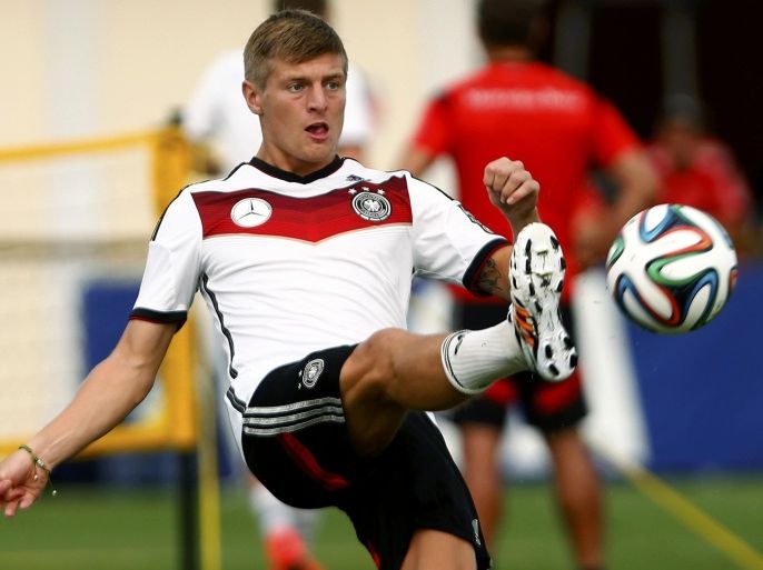 Germany's national soccer team player Toni Kroos kicks a ball during a training session in the village of Santo Andre north of Porto Seguro July 10, 2014. REUTERS/Arnd Wiegmann (BRAZIL - Tags: SOCCER SPORT WORLD CUP)
