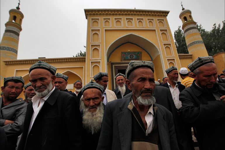 epa03728835 (11/18) Muslim men of the Uighur ethnic group leave the Id Kah Mosque after Friday prayers in Kashgar, Xinjiang Uighur Autonomous Region, China, 24 May 2013. Uighurs, a Muslim ethnic minority group in China, make up about 40 per cent of the 21.8 million people in Xinjiang, a vast, ethnically divided region that borders Pakistan, Afghanistan, Kazakhstan, Kyrgyzstan and Mongolia. Other ethnic minorities living in the region include the Han Chinese, Kyrgyz, Mongolian and Tajik