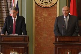 British Foreign Minister Philip Hammond (L) and his Egyptian counterpart Sameh Shoukry (R) address a joint news conference, following their meeting regarding the situation in Gaza, in Cairo, July 24, 2014. Hamas must agree to a humanitarian ceasefire without conditions, Hammond said at news conference in Cairo on Thursday, as Egypt tries to mediate a truce between Israel and Palestinians in the Gaza Strip. REUTERS/Mohamed Abd El Ghany (EGYPT - Tags: POLITICS CIVIL UNREST)