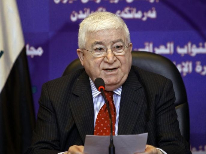 FILE - In this Tuesday, July 27, 2010, file photo, Acting Speaker Fouad Massoum speaks to the press after an Iraqi Parliament session in Baghdad, Iraq. Kurdish Massoum was named Iraq’s new president on Thursday, Massoum, 76, one of the founders of President Jalal Talabani’s Patriotic Union of Kurdistan party, known as PUK, accepted the position after winning two-thirds of the votes, noting the “huge security, political and economic tasks" facing the government. (AP Photo/Hadi Mizban, File)