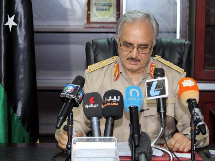 Retired Libyan General Khalifa Haftar speaks during a news conference at an airbase, in Benghazi, Libya, 24 May 2014. Hundreds of Libyans on 23 May took to the streets in the country's two biggest cities in a show of support for a controversial military campaign launched by Haftar against radical Islamist militias. Haftar, who joined the 2011 armed uprising that toppled long-time dictator Muammar Gaddafi, has said his action aims at driving "terrorists" out of the country.