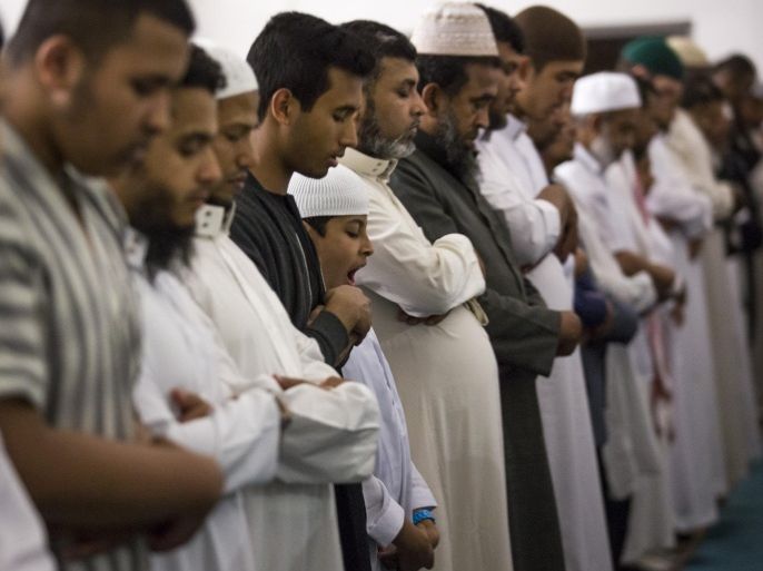 LONDON, ENGLAND - JUNE 28: Muslim men conduct Tarawih prayers, during which long portions of the Qur'an are recited, at the East London Mosque on the evening before the start of the holy month of Ramadan on June 28, 2014 in London, England. Muslim men and women across the world begin to observe Ramadan, a month long celebration of self-purification and restraint, on Sunday. During Ramadan, the Muslim community fast, abstaining from food, drink, smoking and sex between sunrise and sunset, breaking their fast with an Iftar meal after sunset.