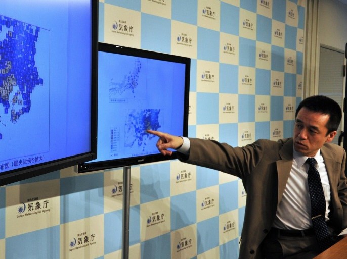 Japan Meteorological Agency officer Yohei Hsegawa speaks during a press conference in Tokyo on May 5, 2014. A strong 6.0-magnitude earthquake shook buildings in Tokyo early on May 5, seismologists and AFP reporters said, but officials stressed there was no risk of a tsunami. AFP PHOTO / Yoshikazu TSUNO