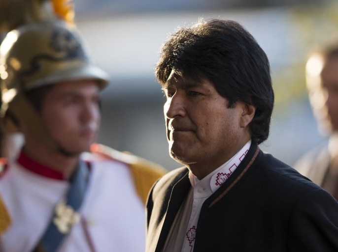 Bolivia's President Evo Morales leaves the Itamaraty Palace after attending the final day of the BRICS Summit in Brasilia, Brazil, Wednesday, July 16, 2014. (AP Photo/Felipe Dana)