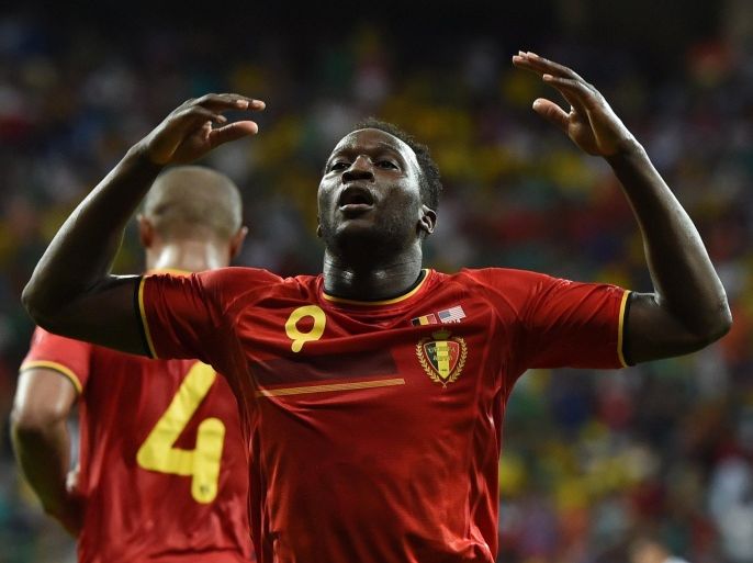 Belgium's forward Romelu Lukaku celebrates after scoring during the first half of extra-time in the Round of 16 football match between Belgium and USA at Fonte Nova Arena in Salvador during the 2014 FIFA World Cup on July 1, 2014. AFP PHOTO/ FRANCISCO LEONG