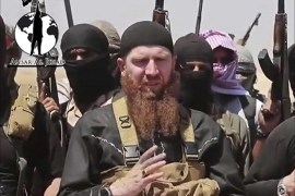 عمر الشيشاني يقاتل في صفوف تنظيم الدولة الإسلامية في العراق والشام إلى جانب المئات من المقاتلين العرب والأجانب - أسوشيتيدبرس (مجلة الجزيرة)