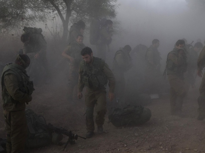 العملية العسكرية الإسرائيلية في غزة أدت إلى مقتل 52 جنديا وفق كتائب القسام (رويترز)