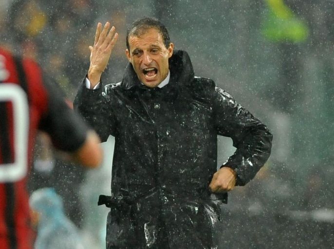 AC Milan coach Massimiliano Allegri gestures during a Serie A soccer match between Juventus and AC Milan at the Juventus stadium, in Turin, Italy, Sunday, Oct. 6, 2013. (AP Photo/Massimo Pinca)