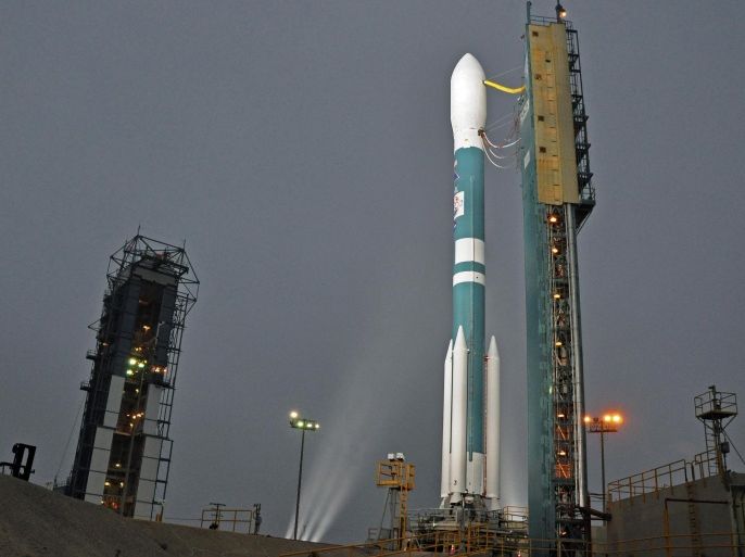In this Monday, June 30, 2014, photo released by NASA, shows NASA's Orbiting Carbon Observatory-2, perched atop a United Launch Alliance Delta II rocket, awaiting launch at the Vandenberg Air Force Base in central California. The launch of NASA's Orbiting Carbon Observatory-2 (OCO-2) aboard a United Launch Alliance Delta II rocket is scheduled for Wednesday, July 2 at 2:56 a.m. PDT (5:56 a.m. EDT) from Space Launch Complex 2 at Vandenberg Air Force Base in Calif. (AP Photo/NASA, Randy Beaudoin,VAFB)