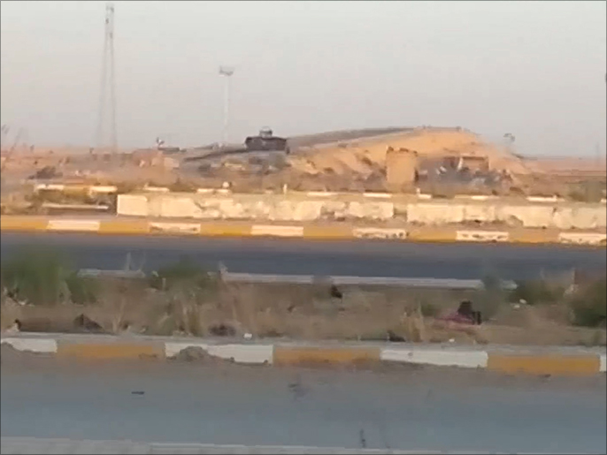 ‪اشتباكات أمس بين مسلحين والقوات الحكومية بمنطقة الخمسة كيلو‬ (الجزيرة)