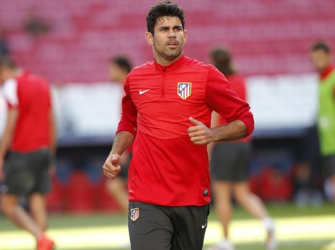 Atleltico's Diego Costa, runs, during a training session ahead of Saturday's Champions League final soccer match between Real Madrid and Atletico Madrid, in Luz stadium in Lisbon, Portugal, Friday, May 23, 2014. (AP Photo/Daniel Ochoa de Olza)