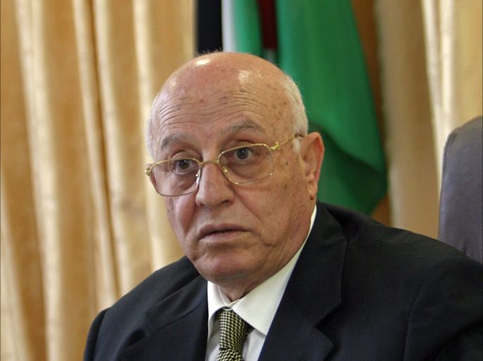 epa000315679 Palestinian Prime Minister Ahmed Qurei attends at a cabinet meeting at his office in the West Bank city of Ramallah on Saturday, 20 November 2004. Qurei urged the United States on Friday to stick to its original 2005 deadline for Palestinian statehood. EPA/ATEF SAFADI