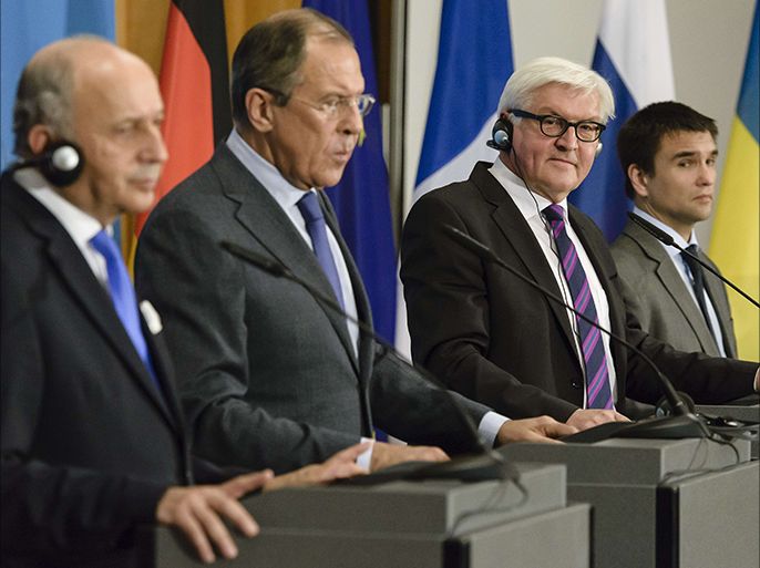 Berlin, Berlin, GERMANY : (L to R) French Foreign Minister Laurent Fabius, Russian Foreign Minister Sergei Lavrov, German Foreign Minister Frank-Walter Steinmeier and Ukrainian Foreign Minister Pavlo Klimkin address a joint press conference after talks at the Federal Foreign Office in Berlin on July 2, 2014. The Foreign Ministers agreed that new ceasefire talks involving the OSCE should start no later than July 5, 2014 on crisis-torn Ukraine. AFP PHOTO / CLEMENS BILAN