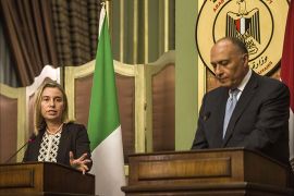 Egyptian Foreign Minister Sameh Shoukry (R) and his Italian counterpart Federica Mogherini attend a press conference in Cairo on July 18, 2014. Federica Mogherini is on a two-day-visit in Egypt as part of a tour in the Middle East region in a bid to broker peace between Israelis and Palestinians