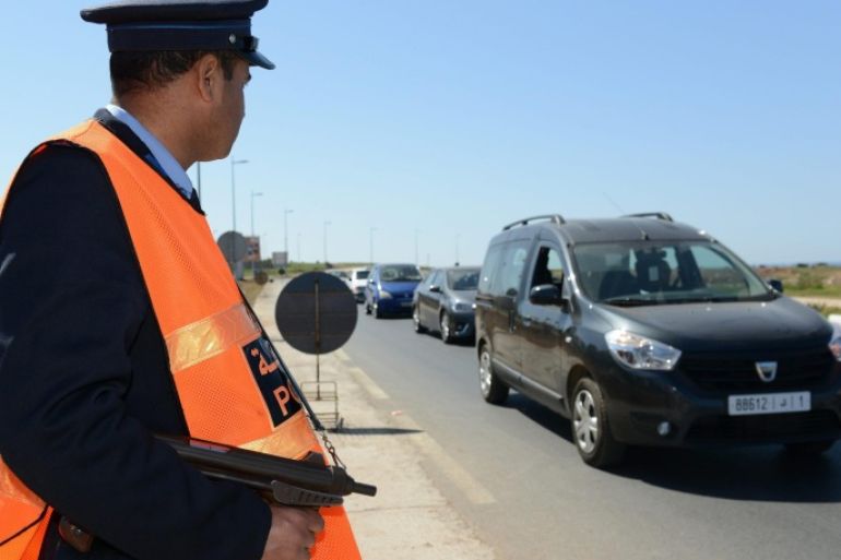 A Moroccan police officer mans a checkpoint at one of the entrances to the city of Rabat, Morocco, 16 March 2014. Spanish Interior Ministry said on 14 March that security forces in Spain and Morocco arrested seven accused members of an Islamist cell recruiting fighters to send to conflict regions, including Syria and Mali. Four people were arrested in southern Spain and three were arrested in Morocco during a joint operation between the countries' police forces.