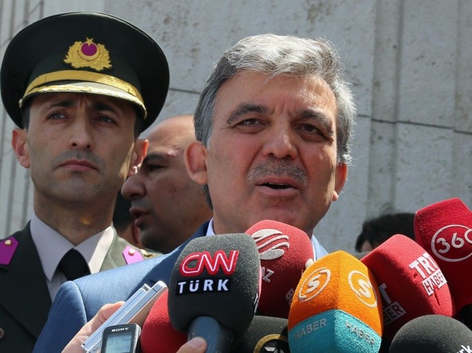 Turkey's President Abdullah Gul speaks to the media outside a mosque in Ankara, Turkey, Friday July 11, 2014. Gul called on Israel to halt its offensive on the Gaza Strip and not to carry out a ground incursion, while the Prime Minister Recep Tayyip Erdogan said there can be no normalizing of Turkish-Israeli ties as long as Israel's actions continue. (AP Photo)
