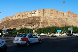epa02414874 (01/24) Believed to be an estimated 7,000 years old, the Citadel of Erbil towers over traffic in the city center of Erbil, Iraq, 13 June 2010. The crumbling castle-city that has towered above Erbil for some 7,000 years has been named a tentative UNESCO World Heritage site