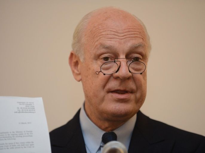 Italy's deputy foreign minister Staffan de Mistura shows a letter from the Indian government as he speaks to the media during a press conference in New Delhi on March 22, 2013. Italy's deputy foreign minister Staffan de Mistura urged India to bring two Italian marines facing murder charges to court quickly as they returned to face trial in New Delhi.
