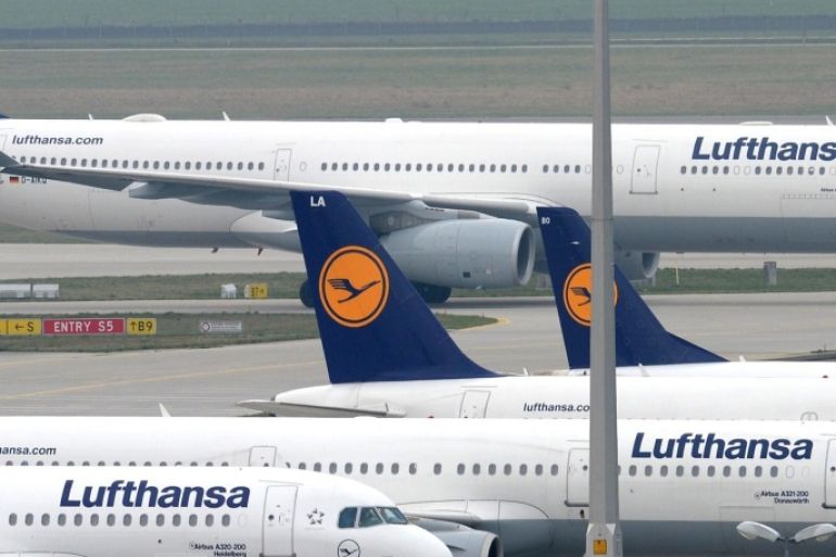 Aircrafts of German airline Lufthansa stand in park position at the Franz-Josef-Strauss-Airport in Munich, southern Germany, on April 4, 2014, during a strike of pilots. Pilots of German airline Lufthansa demanding better pay and retirement conditions began a strike, forcing the carrier to cancel most of its flights for three days and grounding as many as 425,000 passengers. AFP PHOTO/CHRISTOF STACHE