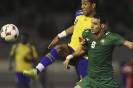 Erbate Elamin of Morocco, right, and Pierre Aymerick Aubameyang,of Gabon challenge for the ball during their Africa Zone Group A World Cup qualifier in Casablanca, Morocco, Saturday March 28, 2009. Gabon win by 2-1.