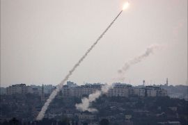 A picture taken from the southern Israeli Gaza border shows a rocket being launched from the Gaza strip into Israel, on July 11, 2014.