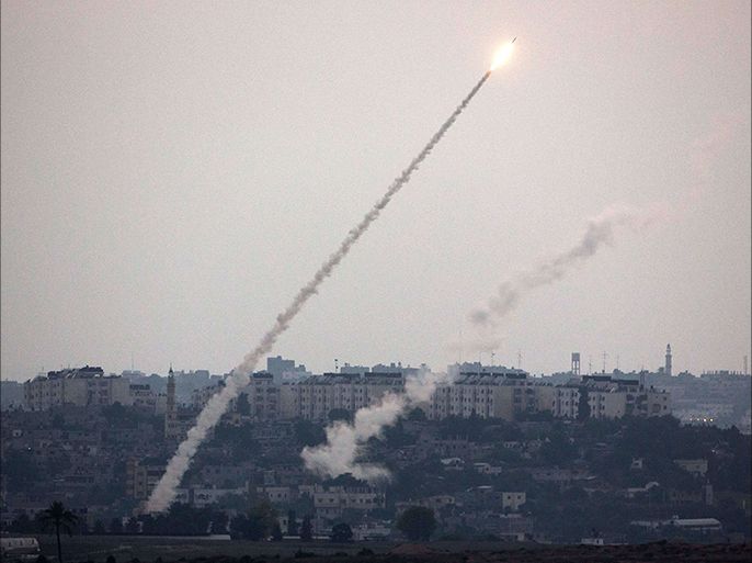 A picture taken from the southern Israeli Gaza border shows a rocket being launched from the Gaza strip into Israel, on July 11, 2014.