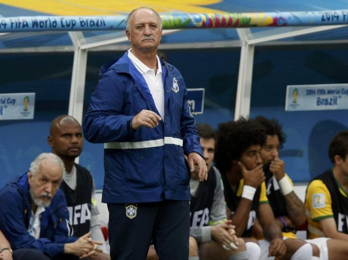 Brazil's coach Luiz Felipe Scolari watches as his team play against the Netherlands during their 2014 World Cup third-place playoff at the Brasilia national stadium in Brasilia July 12, 2014. REUTERS/Ueslei Marcelino (BRAZIL - Tags: SOCCER SPORT WORLD CUP)