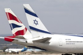 A photo taken on May 19, 2014 shows El-Al (R) and British Airways planes at Israel's Ben Gurion International Airport. AFP PHOTO / JACK GUEZ