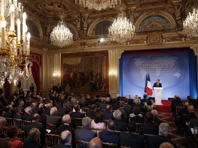 French President Francois Hollande delivers a speech during the annual Conference of Ambassadors at the Elysee Palace in Paris August 28, 2014. French President said on Thursday that opposition forces fighting Islamic State militants in Syria and Iraq should have more Western support, but Syrian President Bashar al-Assad could not be an ally against jihadists. REUTERS/Christophe Ena/Pool (FRANCE - Tags: POLITICS)