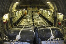 This image released by the U.S. Air Force, shows pallets of bottled water loaded aboard a U.S. Air Force C-17 Globemaster III aircraft in preparation for a humanitarian airdrop over Iraq, Friday, Aug. 8, 2014. (AP Photo/U.S. Air Force, Staff Sgt. Vernon Young Jr)
