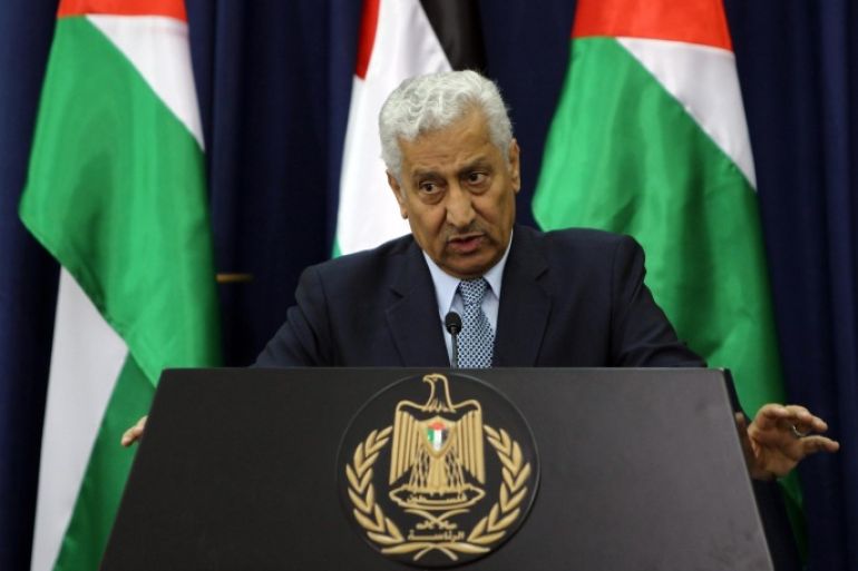 Jordanian Prime Minister Abdullah Nsur speaks to the press as Palestinian president Mahmud Abbas (unseen) listens on following their meeting in the West Bank city of Ramallah, on April 23, 2014. AFP PHOTO / ABBAS MOMANI