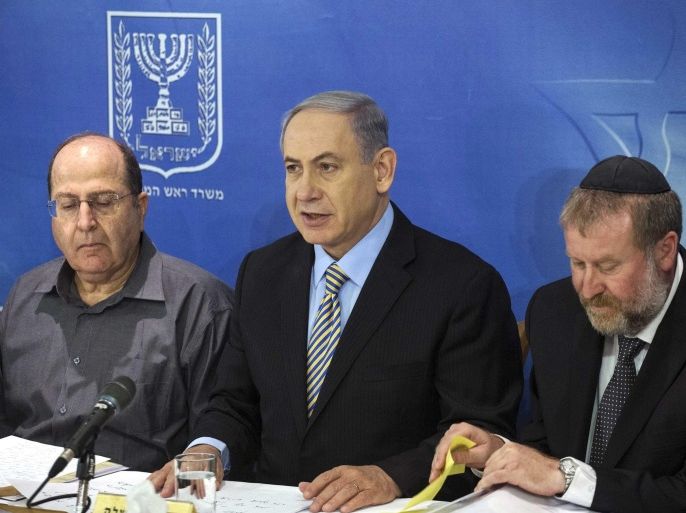 Israel's Prime Minister Benjamin Netanyahu (C) attends a cabinet meeting in Tel Aviv August 10, 2014. Israel said on Sunday it would not return to Egyptian-mediated ceasefire talks as long as Palestinian militants in Gaza kept up cross-border rocket and mortar fire. The head of the Palestinian delegation in Cairo said earlier that it would pull out unless Israeli negotiators, who flew home from the Egyptian capital on Friday hours before a three-day ceasefire expired, came back to the talks. REUTERS/Baz Ratner (ISRAEL - Tags: POLITICS CONFLICT CIVIL UNREST)