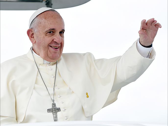 Pope Francis waves as he arrives to celebrate a mass on the occasion of the closing of the 6th Asian Youth Dayin Haemi-myeon, South Korea, South Korea, 17 August 2014. Pope Francis is on an official visit to South Korea from 14 to 18 August 2014 to attend the Asia Youth Day in Daejeon. The pontiff led the beatification ceremony of 124 Korean martyrs. EPA/DANIEL DAL