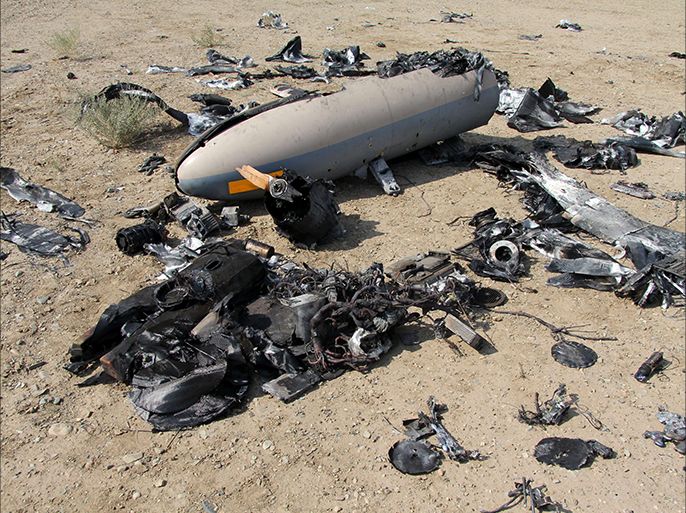 IRAN : A handout picture released by the official website of Iran's Revolutionary Guard on August 25, 2014, shows an alleged Israeli drone that was shot down above the Natanz uranium enrichment site. Iran's elite Revolutionary Guard said it brought down an Israeli stealth drone above the Natanz uranium enrichment site in the centre of the country on August 24, 2014. Natanz is Iran's main uranium enrichment site, housing more than 16,000 centrifuges. Around 3,000 more are at the Fordo plant, buried inside a mountain and hard to destroy. AFP