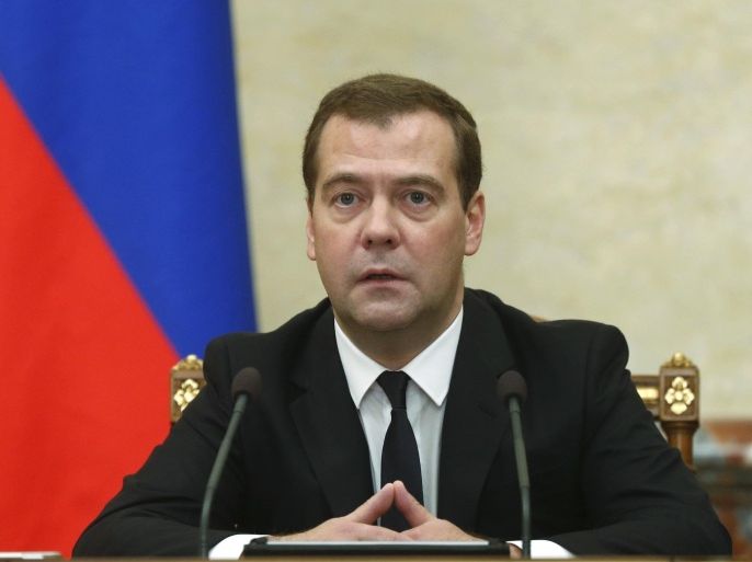 Russian Premier Dmitry Medvedev announces sanctions at the Cabinet meeting in Moscow on Thursday, Aug. 7, 2014.The Russian government has banned all imports of meat, fish, milk and milk products and fruit and vegetables from the United States, the European Union, Australia, Canada and Norway, Prime Minister Dmitry Medvedev announced Thursday. The move was taken on orders from President Vladimir Putin in response to sanctions imposed on Russia by the West over the crisis in Ukraine. The ban has been introduced for one year. (AP Photo/RIA Novosti, Dmitry Astakhov, Government Press Service)