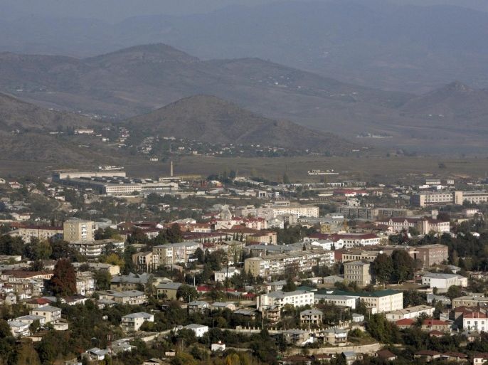 A general view of Nagorno Karabakh's main city of Stepanakert is seen in this October 30, 2009 file photo. Sporadic fire fights have intensified along the front line around Nagorno-Karabakh, a mountainous enclave within Azerbaijan in the South Caucasus controlled by ethnic Armenians since a war in the early 1990s that killed about 30,000 people. To match AZERBAIJAN-ARMENIA/CONFLICT REUTERS/David Mdzinarishvili/Files (AZERBAIJAN - Tags: POLITICS CITYSPACE)