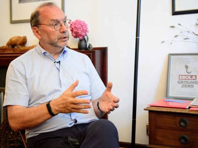 Professor Peter Piot, the Director of the London School of Hygiene and Tropical Medicine, speaks during an interview at his office in central London, England, on July 30, 2014. Professor Piot was one of the co-discoverers of the Ebola virus during its first outbreak in Zaire, in 1976. AFP PHOTO/Leon NEAL