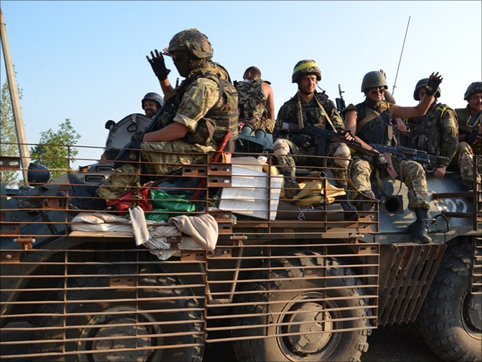 ‪جنود أوكرانيون عائدون‬ (الجزيرة نت)