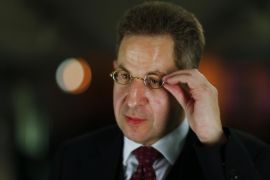 Hans-Georg Maassen, president of Germany's domestic security agency, the Federal Office for the Protection of the Constitution (verfassungsschutz), adjusts his glasses during a Reuters interview in Berlin November 12, 2013. TO GO WITH INTERVIEW DEUTSCHLAND-SPIONAGE/VERFASSUNGSSCHUTZ REUTERS/Pawel Kopczynski (GERMANY - Tags: CRIME LAW POLITICS HEADSHOT)