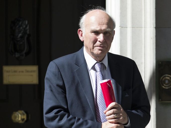 LONDON, ENGLAND - JUNE 10: Business Secretary Vince Cable leaves Number 10 Downing Street after attending the weekly Cabinet meeting on June 10, 2014 in London, England. British Prime Minster David Cameron has backed Education Secretary Michael Gove's proposals for schools in England to promote 'British values'.