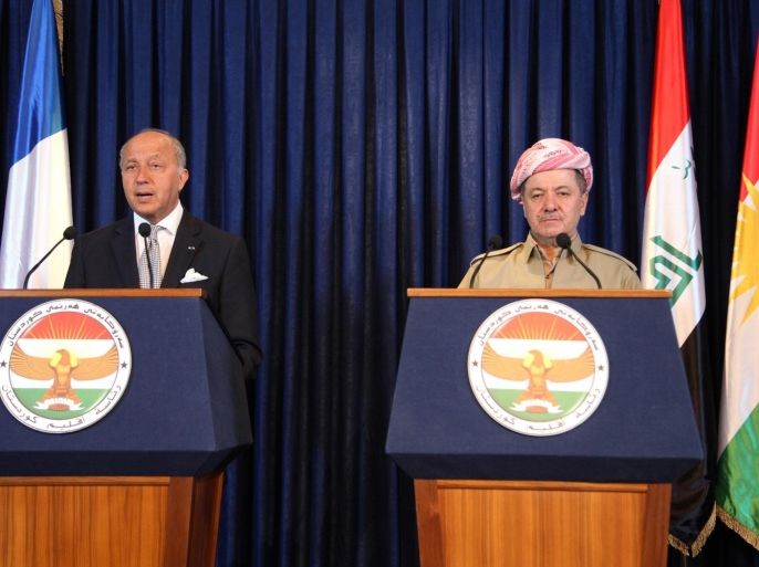 French Foreign Affairs Minister Laurent Fabius (L) speaks during a news conference with Iraqi Kurdish regional President Masoud Barzani in Arbil, north of Baghdad, August 10, 2014. Fabius visited the capital of Iraqi Kurdistan after his country said it was ready to support the region's forces in blocking the incursion of Islamic State militants. REUTERS/Azad Lashkari (IRAQ - Tags: POLITICS)