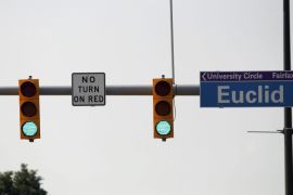 (FILE) A file picture dated 22 July 2014 shows a red traffic light hanging over the intersection of Euclid Avenue and East 105th street in Cleveland, Ohio, USA. The intersection is the very site where on 05 August 2014 the world first ever electric traffic signal was installed.