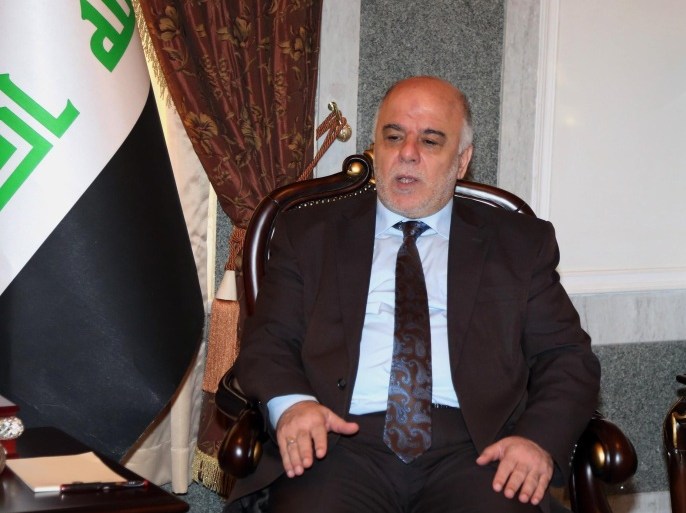 Iraqi premier-designate Haider al-Abadi meets with Pastor Farouk Yousuf in Baghdad, Iraq, Thursday, Aug. 21, 2014. Al-Abadi has until Sept. 11 to submit a list of Cabinet members to parliament for approval. Religious and ethnic minorities have called upon him to assemble an all-inclusive government. (AP Photo/Karim Kadim, Pool)